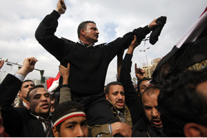 Egypt military dissolves parliament, suspends constitution