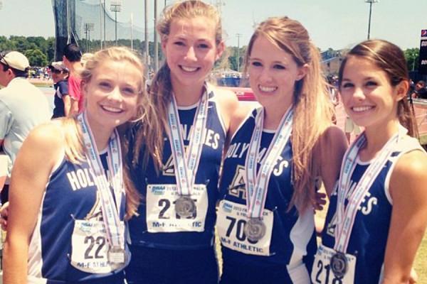 Collen Doherty, second from the left, is picutred with her teammates after winning the state 4x800.