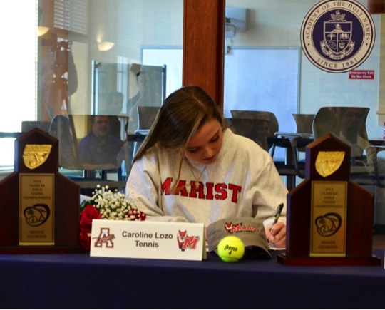 Caroline signs to finalize her commitment to Marist College