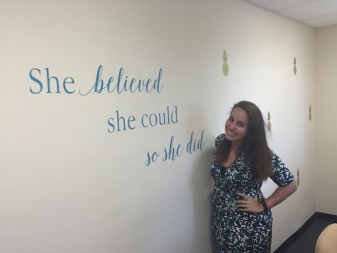 Academy of the Holy Names alum and Learning Specialist Danica Rodriguez, with her favorite encouraging quote. Credit: Jacqueline Brooker 