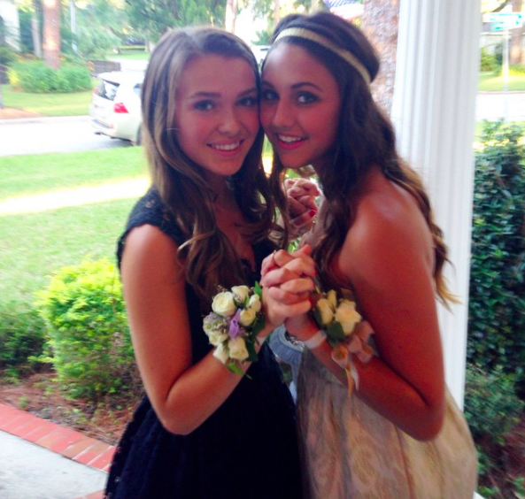 Sarah Conn (10) and Alexandra Traviesa (10) take some pictures before heading off to group Homecoming pictures 