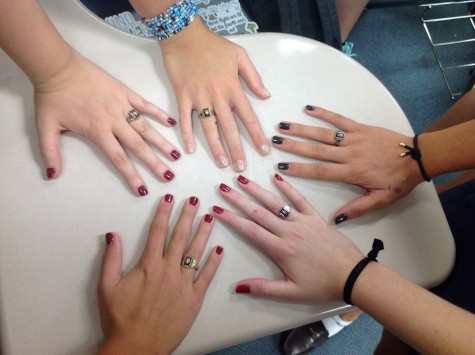 Grayson Garraty, Natalie Cevallos, Lindsay Boos, Veronica Sanchez and Taylor Shaw display their freshly manicured nails from Homecoming. 