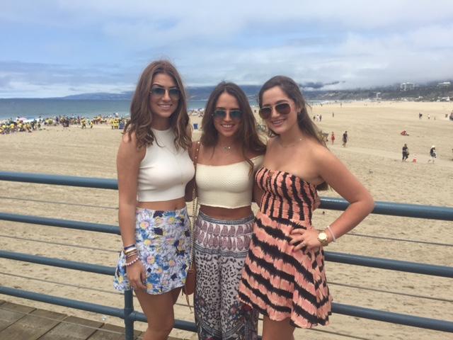 Gabby Accardi (12) with her two sisters, alumni Gianna Accardi and Ava Accardi at the Santa Monica Pier. 