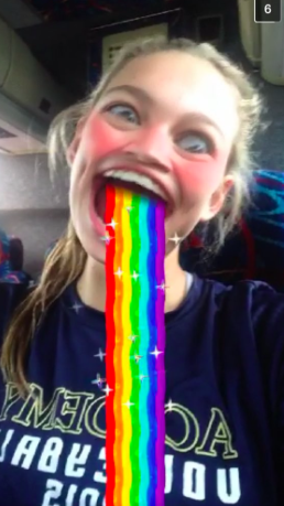 Junior, Camille Opp, shows off her goofy side by using the rainbow facial feature that snapchat offers!