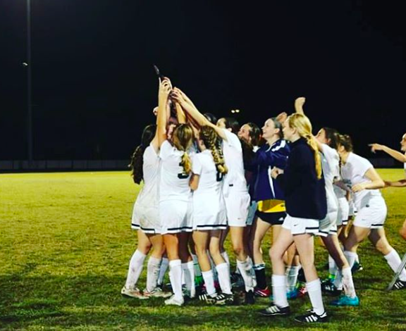 The team celebrates moment after beating Berkely. 