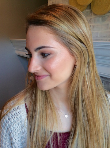 Senior, Carolina Oliva, shows off her highlighted cheek bone with an illuminated makeup look