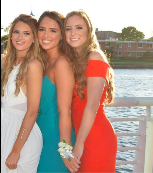 AHN Seniors pose for their complete prom look with a spray tan. 