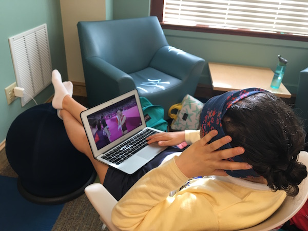 Senior Victoria Baldor watches the highlights of the trampoline events during her study hall. Baldor only recently discovered trampoline, but she is very intrigued by it. 