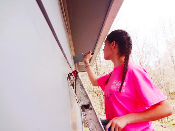 Credit: Maria Cacciatore/ Achona Online 
Senior, Maria Cacciatore loves painting houses on her mission trip last year in Appalachia.
