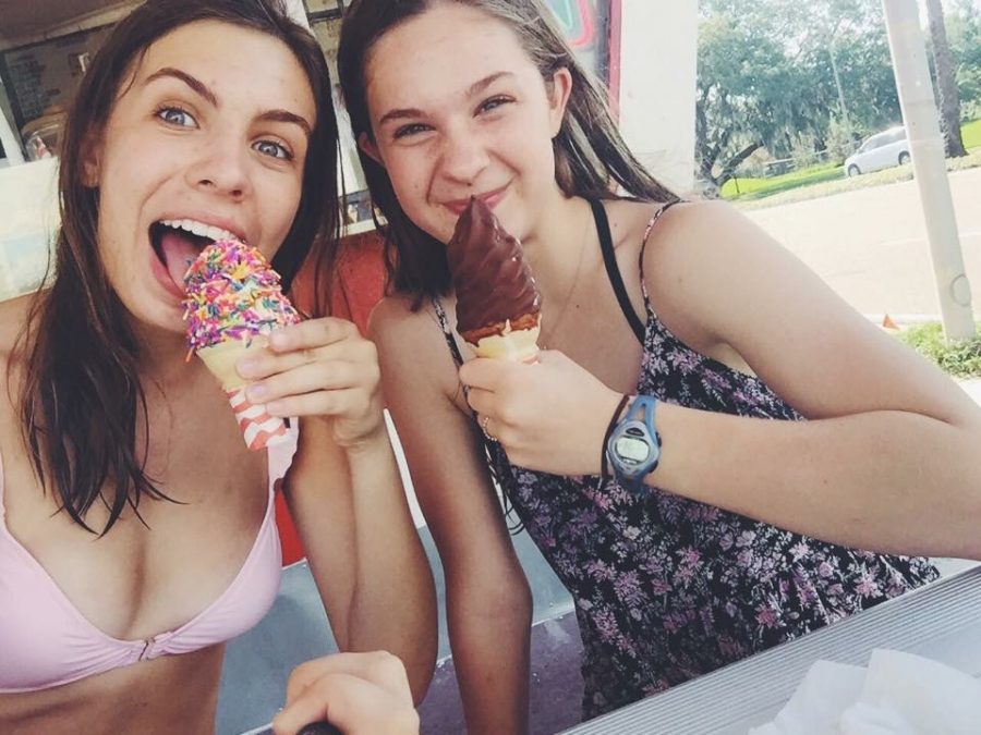 Best friends Lizzie Dolan and Lindsay Calka, enjoy ice cream on a hot summer day. Dolan explains, "Lindsay is my person. I go to her for everything." 