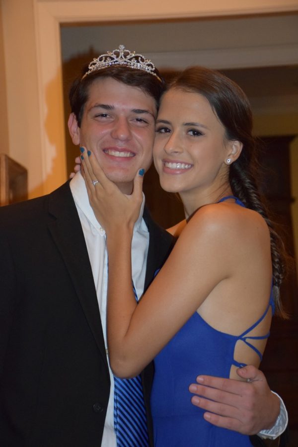 Credit: Devin Folkman/Achona Online
Folkman pretends her date, Brock Mondor, won Homecoming Queen by placing the crown on his head.