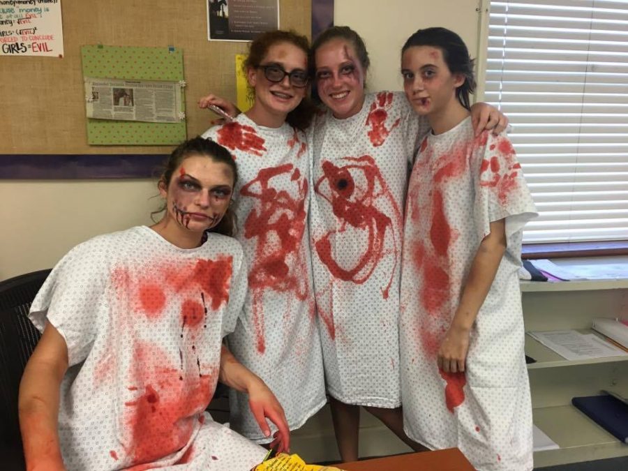 Sophomore representatives Charli Young, Sophie Ragano, Charlotte Carl, and Olivia Fernandez pose as patients after a surgery "gone wrong". Photo Credit: Alex Smith/Achona Online