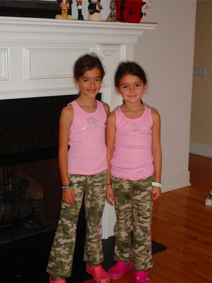 Riley Rubio and Victoria Baldor represent their jag shop attire with tanks saying Academy Princess.