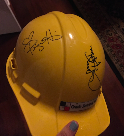 Senior Vanessa Alvarez was given a hardhat during her father's work on Extreme Home Makeover where she received a couple autographs from the cast. Photo Credits: Vanessa Alvarez/AchonaOnline