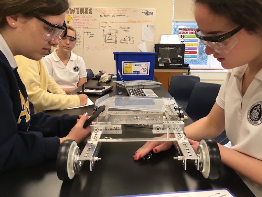 A logbook is a how-to guide for a robotics team. It is a record of their progress and ideas. Senior Cris Renner says If another team was to pick up your logbook they should be able to build your robot. At this years regional competition, the Academy-Jesuit robotics team was runner-up for best logbook.