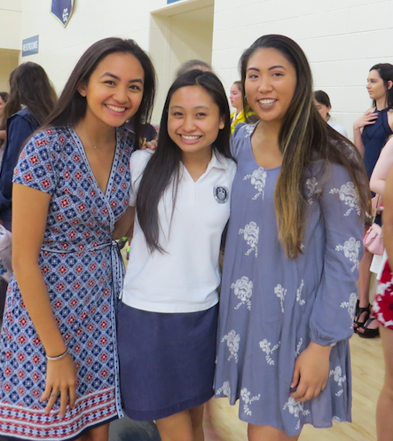 Seniors, Chloe Paman and Rachel Rosales, smile with their cousin, Junior, Gillian Garcia. Photo Credit: Sara Phillips/AchonaOnline