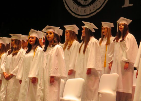 The traditional white cap and gown has been used at all AHN graduations. Photo Credit: Sara Phillips/AchonaOnline