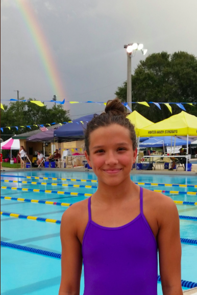 The rainbow above Cailins head became a symbol of God watching over her to many of her friends and family. Photo Credit: Academy Aquatic Club/Used With Permission