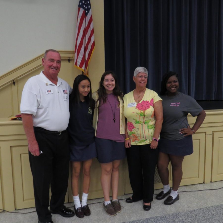 Seniors Gillian Garcia, Haley Palumbo, and Lyric Vickers thanked the two veterans for their service following the convocation. Photo Credit: Mia Lopez/ Achona Online  