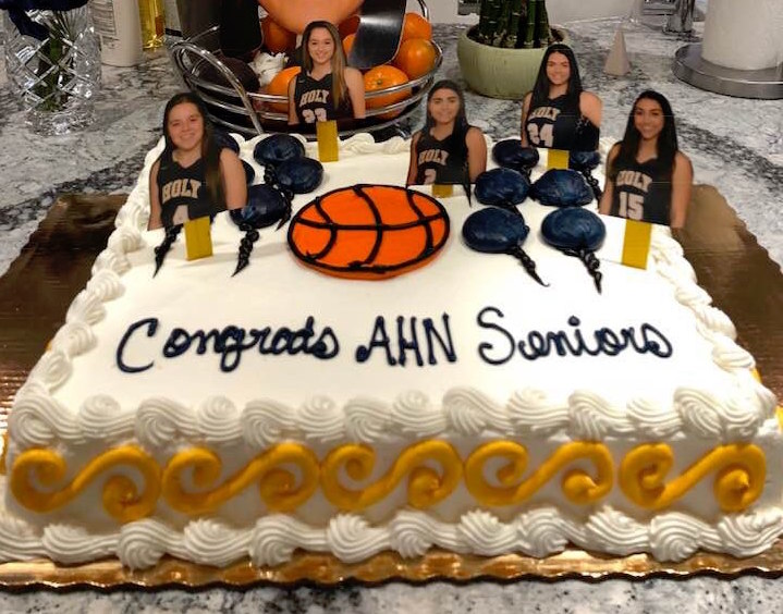 The+seniors+parents+printed+out+figures+of+the+players+to+put+into+their+cake+for+pictures.+