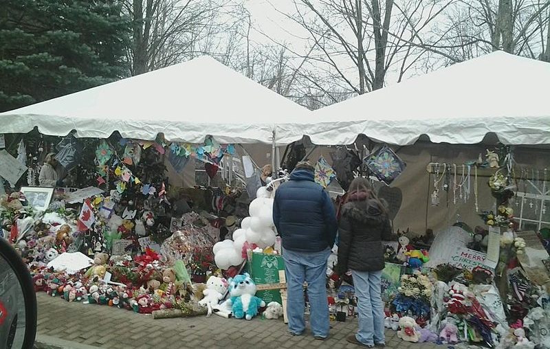 The Sandy Hook Elementary School makeshift memorial on Washington Avenue in Sandy Hook, Conn., 12 days after the shootings at Sandy Hook Elementary School. (Wed 12/26)