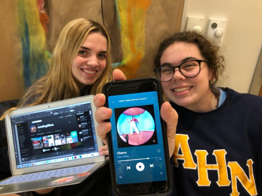 Natalie Gillis (21) and Audrey Barnes (21) show off their Spotify accounts. I love Spotify because I can listen to it when Im in the car, at school, or even at home, said Barnes.