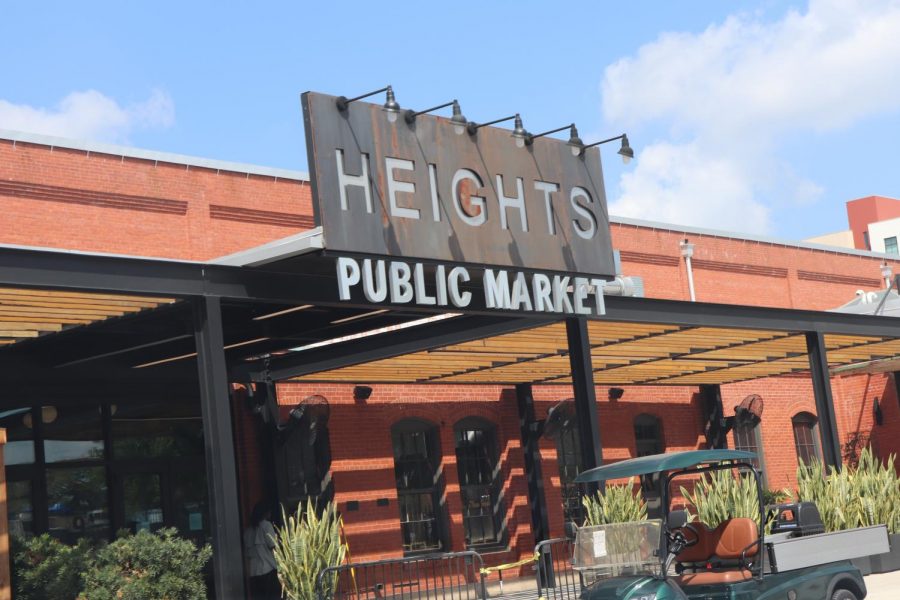 Seminole Heights, a once predominantly black neighborhood, is experiencing gentrification due to the citys renovation efforts and construction of commercial buildings such as Armature Works.