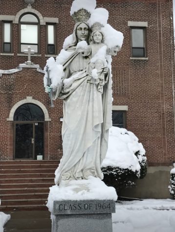 My great-aunt in New Jersey sent me this picture of one of my favorite statues after it had snowed.