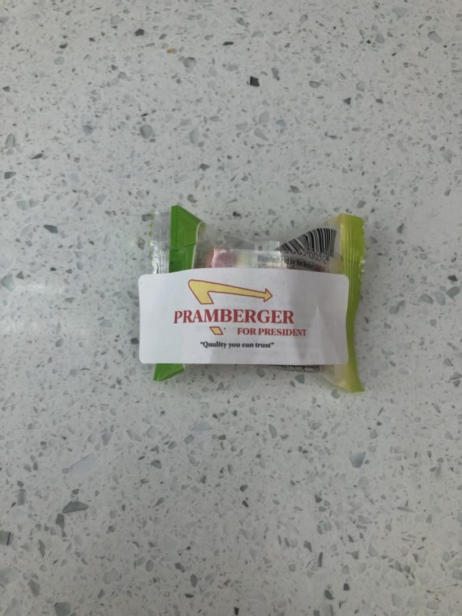A burger gummy with a sticker that Pramberger passed out to students as part of her campaign.
