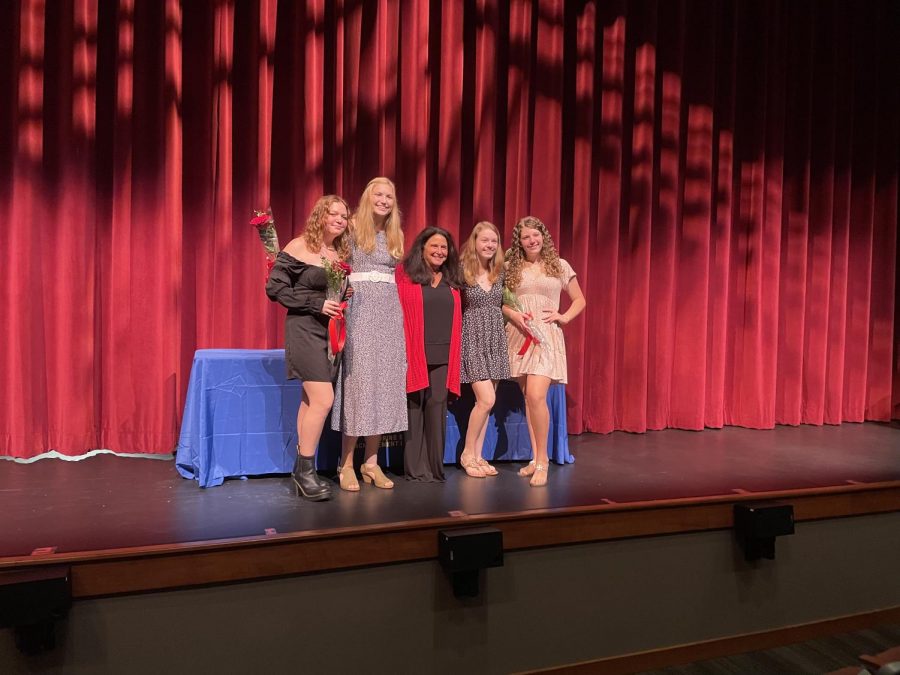 The new members pose with moderator Vivian Kimbler after the event.