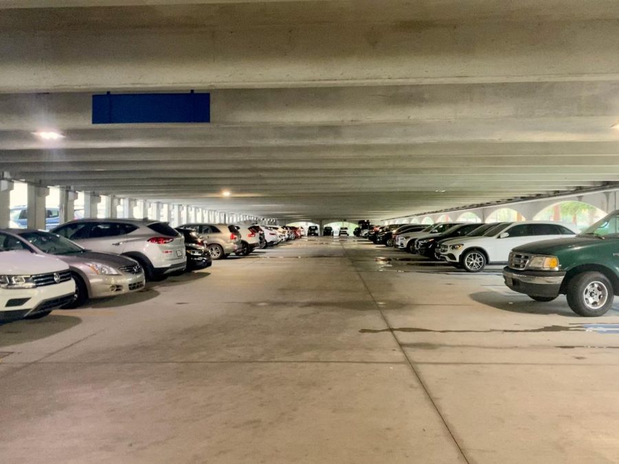Juniors and Seniors park their cars in the parking garage near the arts building.