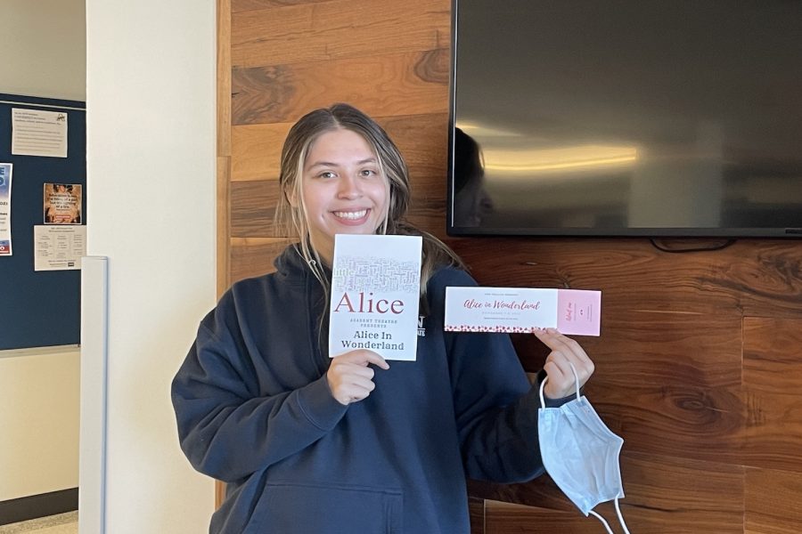 Stage manager Isabel Bequer (‘23) shows off the playbill and ticket for the recent production.