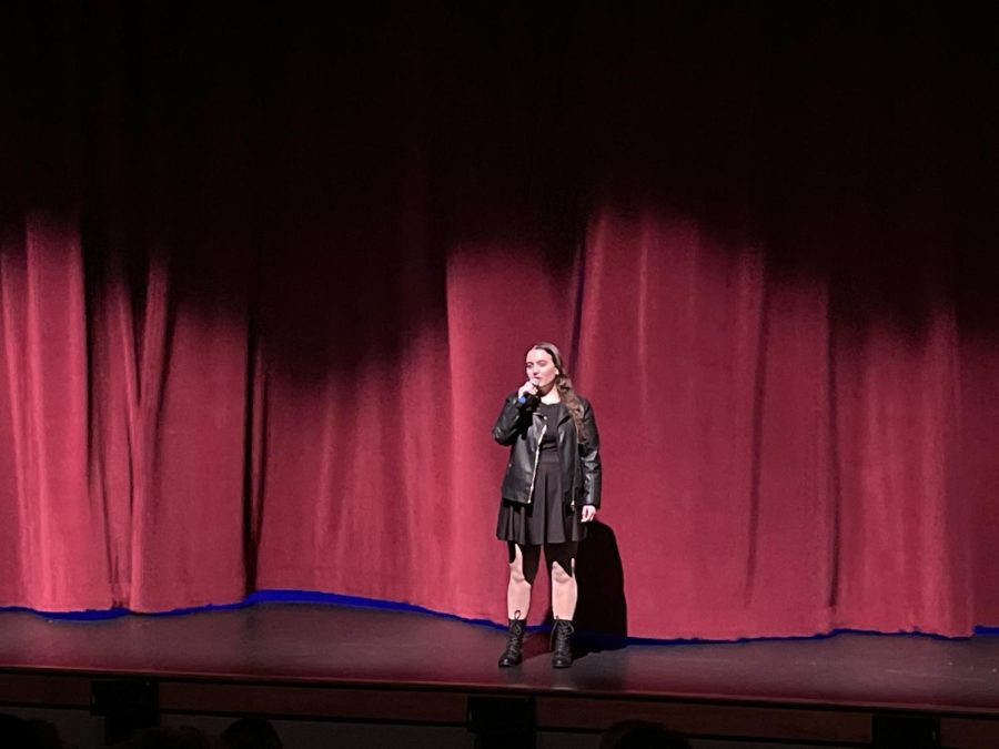 Bethany Masiello (22) performing a solo song. 