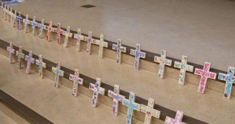 The seniors each made crosses to reflect the people they had become while at the Academy. 