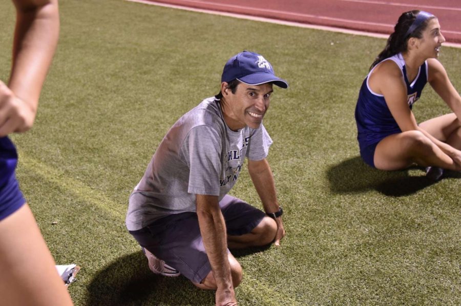 Mr. Rodriguez is happy as always to be coaching the girls track team at a meet in 2022.  
