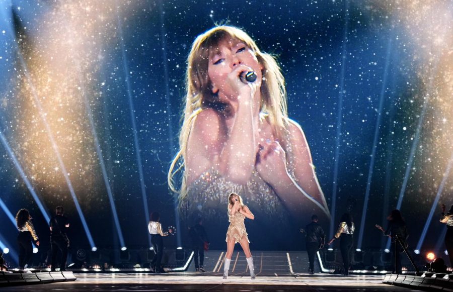 Taylor Swift, the 33-year-old pop star, performs one of her concerts on her Eras Tour which sparked mass mayhem in the public due to the large demand for concert tickets. (buzzfeednews.com/ Achona Online)
