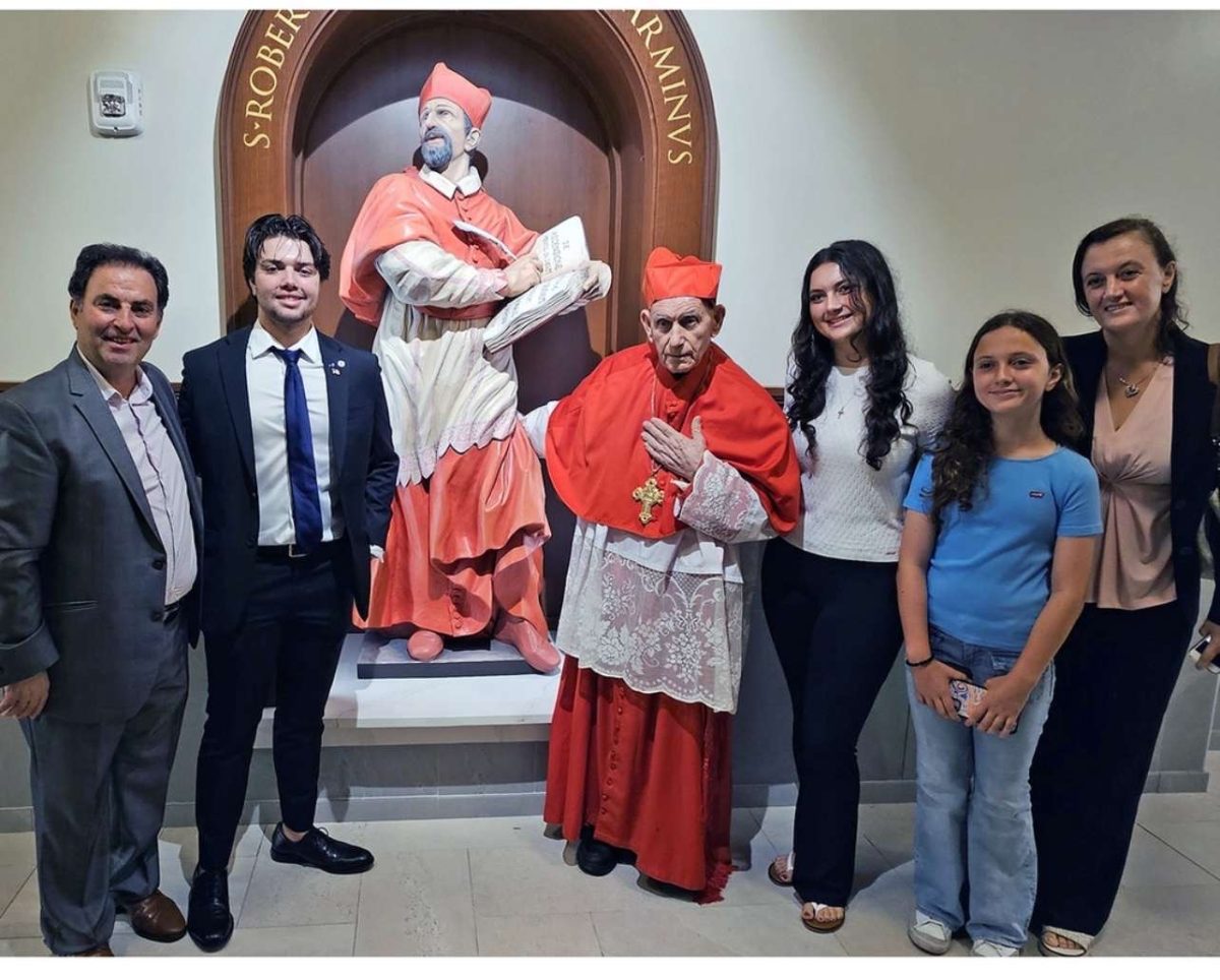 Nijal family with Cardinal Ernest Simoni at Jesuit High School.