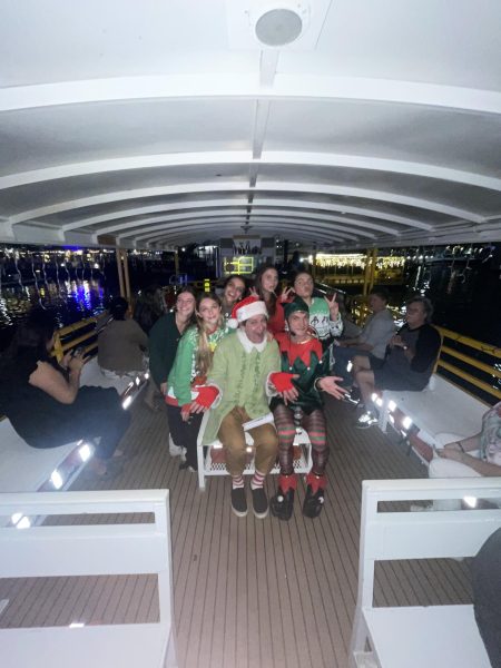 Katie Pearson, Kiley Lester, Olivia Vargas, Peyton Pickett, and Mariana Guzman ('25) celebrate the holiday on a Christmas Cruise. 