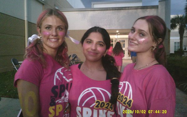 Academy girls at "Spike n' Splash" taking a digital camera photo