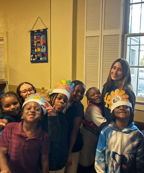 Members of the club volunteer for the kids' annual thanksgiving party. 