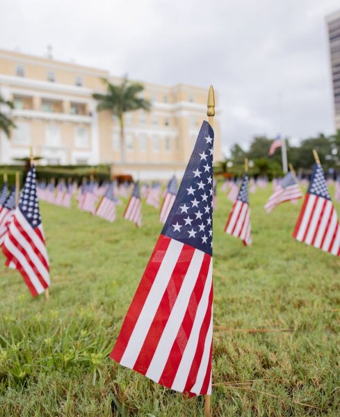 Academy puts American flags all around the outside lawn for 9/11