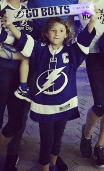 Mischa Martin ('26) attending a Bolts Game in 2014 at Amalie Arena. 