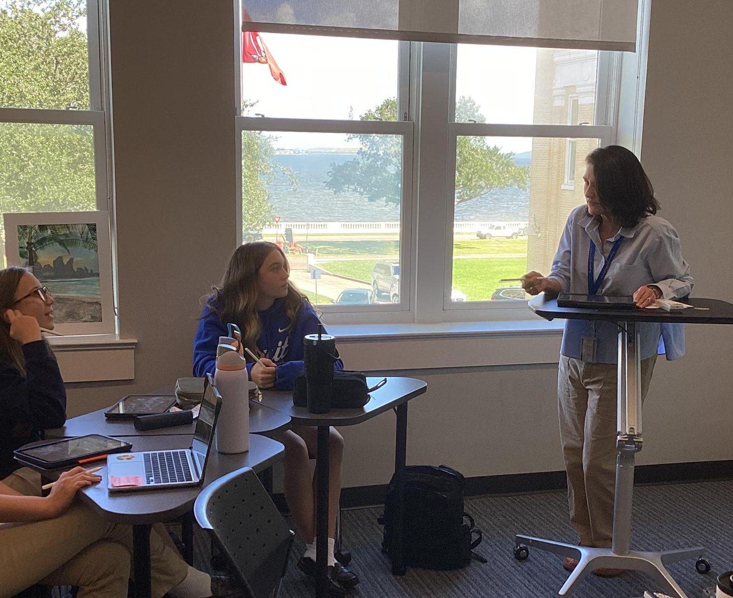 Laura Howard teacher her Algebra II students