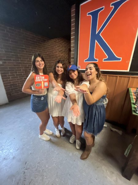 Lola Accardi, Stella Alvarez, and Maria Alvarez love the gators.