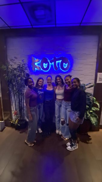 Louise enjoys hibachi with friends.