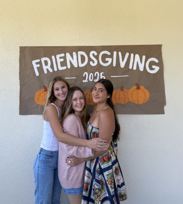 Ainsley Maynard ('28), Colleen Kaley ('28), and Ameerah Kazbour ('26) at their friendsgiving. 