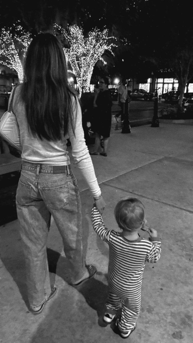 Annabelle with her nephew walking Hyde Park.
