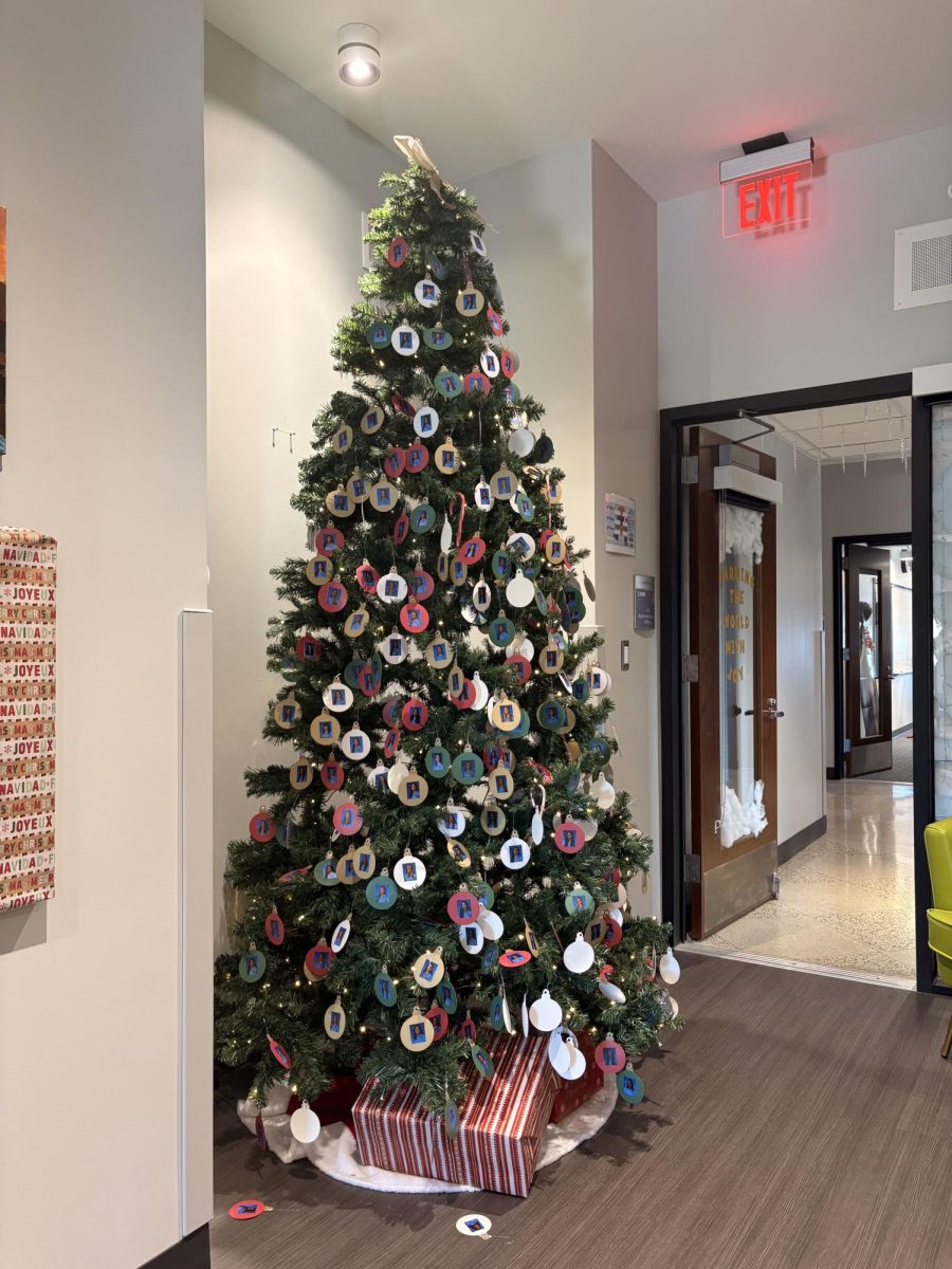 The Christmas tree in the administrator's office with the student's school photos as ornaments.