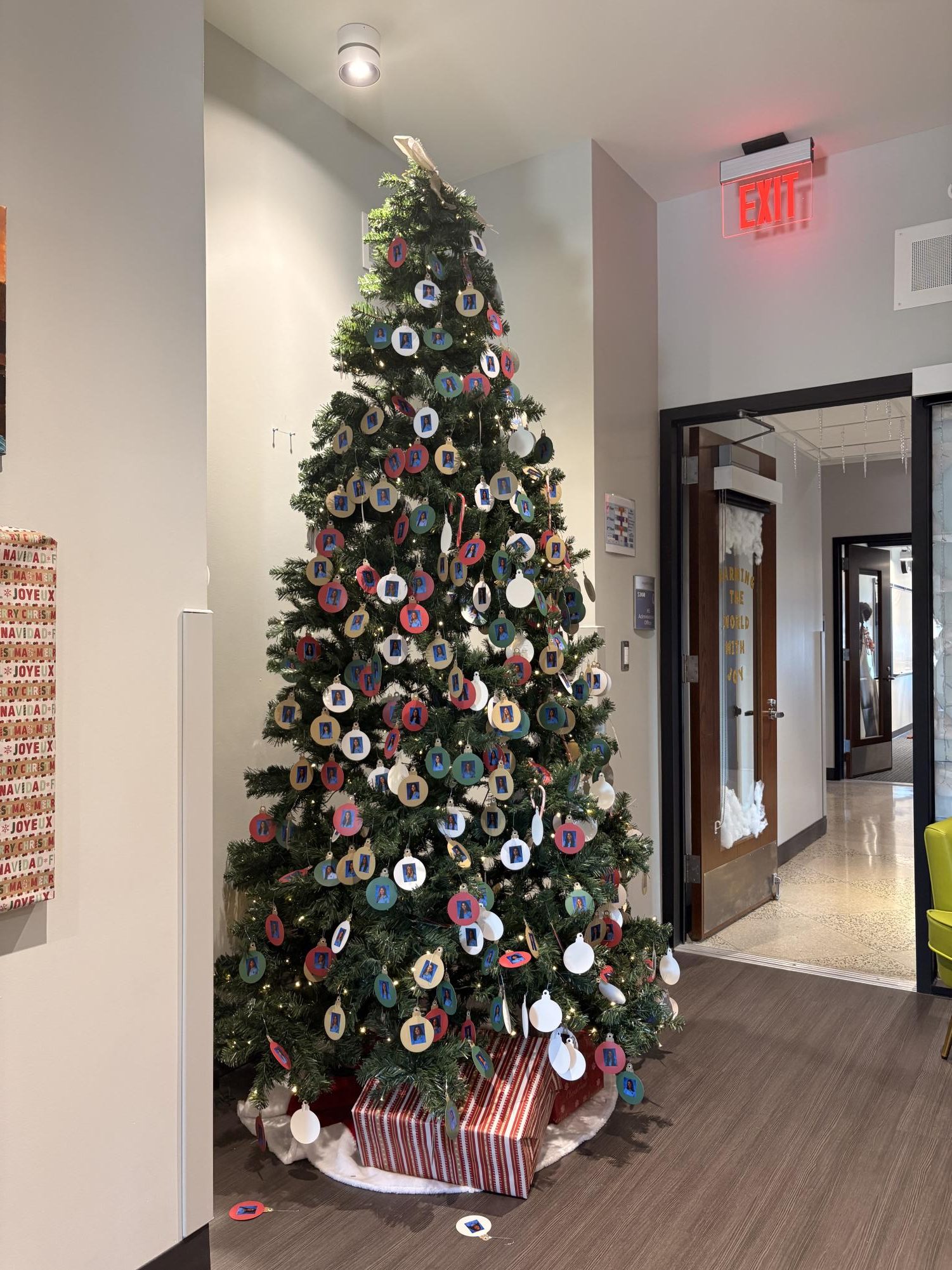 The Christmas tree in the administrator's office with the student's school photos as ornaments.