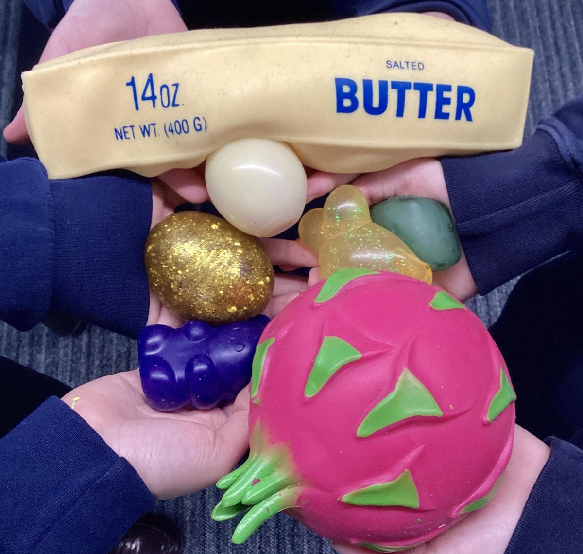 Students hold squishies.